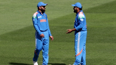 Cricket - ICC Men's Champions Trophy - Group A - India v Pakistan - Dubai International Stadium, Dubai, United Arab Emirates - February 23, 2025 India's Rohit Sharma reacts with Virat Kohli REUTERS/Satish Kumar (REUTERS)