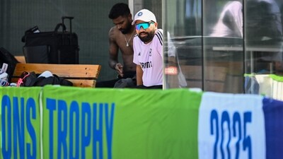 India's captain Rohit Sharma (R) watches his teammates during a practice session at the ICC Academy ground in Dubai on February 22, 2025, a day ahead of their ICC Champions Trophy one-day international (ODI) cricket match against Pakistan (AFP) India's captain Rohit Sharma (R) watches his teammates during a practice session at the ICC Academy ground in Dubai on February 22, 2025, a day ahead of their ICC Champions Trophy one-day international (ODI) cricket match against Pakistan (AFP)