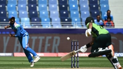 Axar Patel caught Imam-ul-Haq short off his crease during the India versus Pakistan match in Dubai. (AFP) Axar Patel caught Imam-ul-Haq short off his crease during the India versus Pakistan match in Dubai. (AFP)