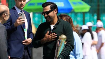 Former Pakistan cricket captain Sarfaraz Ahmed, who led the team to the 2017 Champions Trophy win, with the trophy ahead of the opening game of the current edition in Karachi on February 19. (REUTERS) Former Pakistan cricket captain Sarfaraz Ahmed, who led the team to the 2017 Champions Trophy win, with the trophy ahead of the opening game of the current edition in Karachi on February 19. (REUTERS)