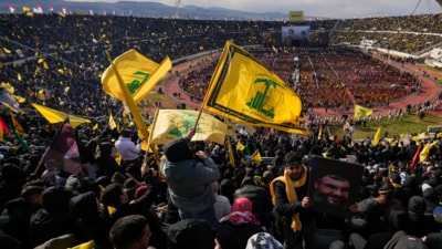 People attend the funeral ceremony of the Hezbollah's former leader Hassan Nasrallah and his cousin and successor Hashem Safieddine at the Sports City Stadium in Beirut, Lebanon, Sunday, Feb. 23, 2025. (AP) People attend the funeral ceremony of the Hezbollah's former leader Hassan Nasrallah and his cousin and successor Hashem Safieddine at the Sports City Stadium in Beirut, Lebanon, Sunday, Feb. 23, 2025. (AP)