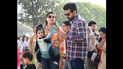Residents enjoying a sunny day at Sector 16 in Chandigarh on Sunday. (Keshav Singh/HT)