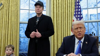 US President Donald Trump speaks next to Elon Musk and X Æ A-12, Musk's son, in the Oval Office of the White House in Washington. (Reuters)