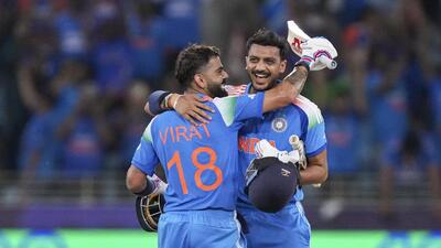 Virat Kohli and Axar Patel celebrate India’s win over Pakistan in the Champions Trophy on Sunday. (PTI) Virat Kohli and Axar Patel celebrate India’s win over Pakistan in the Champions Trophy on Sunday. (PTI)