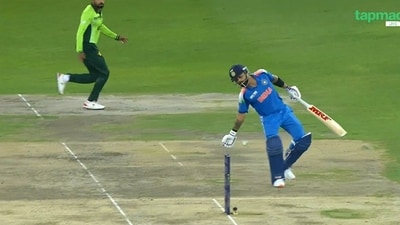 Virat Kohli strangely blocked a throw from a Pakistan fielder (Hotstar) Virat Kohli strangely blocked a throw from a Pakistan fielder (Hotstar)