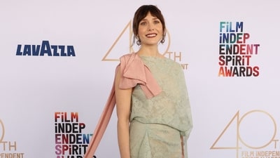 Elizabeth Olsen put a dramatic spin on the sheer trend with her pink bow-topped mint green dress. (AFP) Elizabeth Olsen put a dramatic spin on the sheer trend with her pink bow-topped mint green dress. (AFP)