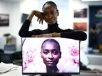 London-based model Alexsandrah Gondora poses for a photograph with her on-screen AI twin "Alex", created by digital modelling agency, The Diigitals in the AFP offices in London on February 21, 2025. My artificial intelligence (AI) replica "basically does the hard work so I don't have to do it," jokes London-based model Alexsandrah Gondora, who enjoys being able to "be in two places at once." London-based model Alexsandrah Gondora poses for a photograph with her on-screen AI twin "Alex", created by digital modelling agency, The Diigitals in the AFP offices in London on February 21, 2025. My artificial intelligence (AI) replica "basically does the hard work so I don't have to do it," jokes London-based model Alexsandrah Gondora, who enjoys being able to "be in two places at once."