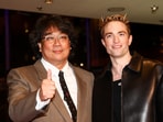 Director Joon-ho Bong and Robert Pattinson attend the screening of the movie 