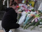 Pennsylvania hospital shooting: A person gets emotional after leaving flowers in front of the West York Police Department after a police officer was killed responding to a shooting at UPMC Memorial Hospital in York, Pa. on Saturday, Feb. 22, 2025. (AP Photo/Matt Rourke) Pennsylvania hospital shooting: A person gets emotional after leaving flowers in front of the West York Police Department after a police officer was killed responding to a shooting at UPMC Memorial Hospital in York, Pa. on Saturday, Feb. 22, 2025. (AP Photo/Matt Rourke)