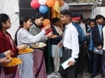 Students were welcomed at the examination center during the UP Board Class 10 and 12 exams in Lucknow, Uttar Pradesh, on Monday. Students were welcomed at the examination center during the UP Board Class 10 and 12 exams in Lucknow, Uttar Pradesh, on Monday.