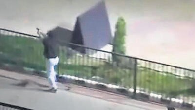 A man seen brazenly firing in the air in Future Heights Society on Kharar-Kurali Road on Monday. (HT Photos)