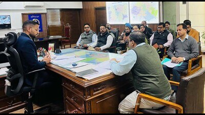 DC Jitendra Jorwal in a meeting with district-level committee officials in Ludhiana on Monday. (HT Photo)