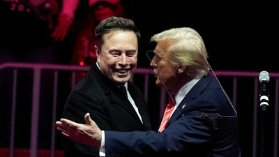 U.S. President-elect Donald Trump greets Tesla CEO and X owner Elon Musk during a rally the day before Trump is scheduled to be inaugurated for a second term, in Washington, U.S., January 19, 2025. (REUTERS)
