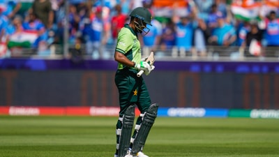 Pakistan's Babar Azam leaves the field after losing his wicket during the ICC Champions Trophy cricket match between India and Pakistan at Dubai International Cricket Stadium, United Arab Emirates, Sunday, Feb. 23 (AP) Pakistan's Babar Azam leaves the field after losing his wicket during the ICC Champions Trophy cricket match between India and Pakistan at Dubai International Cricket Stadium, United Arab Emirates, Sunday, Feb. 23 (AP)