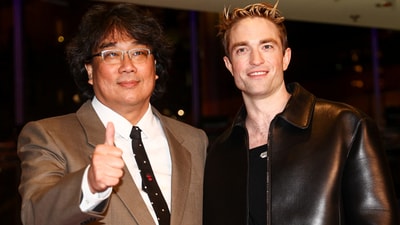 Director Joon-ho Bong and Robert Pattinson attend the screening of the movie "Mickey 17" at the 75th Berlinale International Film Festival in Berlin, Germany February 15, 2025. (REUTERS)