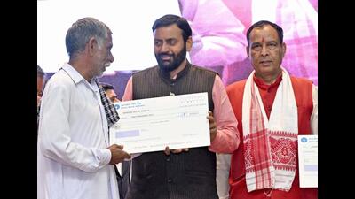 Haryana CM Nayab Singh Saini giving a cheque to a farmer at the state-level function in Jhajjar on Monday. (Sourced) Haryana CM Nayab Singh Saini giving a cheque to a farmer at the state-level function in Jhajjar on Monday. (Sourced)