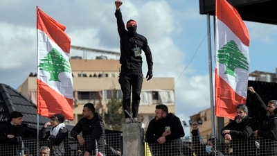 A Hezbollah supporter chants slogans during the funeral procession of Lebanon's former Hezbollah commander Hassan Nasrallah and his cousin and successor, (AP) A Hezbollah supporter chants slogans during the funeral procession of Lebanon's former Hezbollah commander Hassan Nasrallah and his cousin and successor, (AP)
