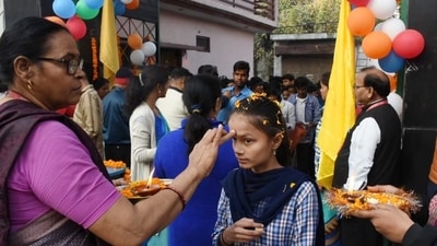 Students were greeted with a tilak on their foreheads and aarti as they entered the exam centre in Lucknow. (Deepak Gupta, Hindustan Times) Students were greeted with a tilak on their foreheads and aarti as they entered the exam centre in Lucknow. (Deepak Gupta, Hindustan Times)