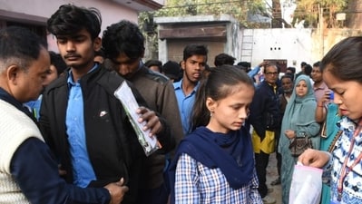 Students being frisked before entering the examination hall. (Deepak Gupta, Hindustan Times) Students being frisked before entering the examination hall. (Deepak Gupta, Hindustan Times)