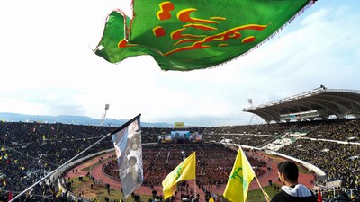 People gather to attend the public funeral ceremony of Hezbollah leaders Hassan Nasrallah and Hashem Safieddine, who were killed during Israeli airstrikes last year, on the outskirts of Beirut, Lebanon. (Reuters)