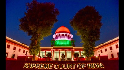 New Delhi, Jan 27 (ANI): Supreme Court of India complex illuminates in Tricolour as part of 76th Republic Day celebrations, in New Delhi on Monday. (ANI Photo/Ritik Jain) (Ritik Jain) New Delhi, Jan 27 (ANI): Supreme Court of India complex illuminates in Tricolour as part of 76th Republic Day celebrations, in New Delhi on Monday. (ANI Photo/Ritik Jain) (Ritik Jain)