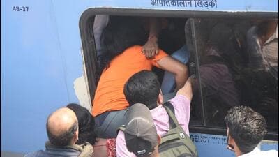 Passengers jostle to board an overcrowded train in Bihar to head to Prayagraj for Mahakumbh on Sunday. (Santosh Kumar/ HT Photo) Passengers jostle to board an overcrowded train in Bihar to head to Prayagraj for Mahakumbh on Sunday. (Santosh Kumar/ HT Photo)