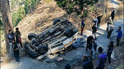 The vehicle that overturned after it rolled down the hill in Ramban on Monday. (HT Photo)