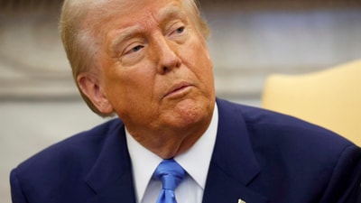 President Donald Trump said his tariffs on Canada and Mexico are starting next month. (AP) President Donald Trump said his tariffs on Canada and Mexico are starting next month. (AP)