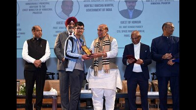 Union defence minister Raj Nath Singh felicitating a meritorious student during at IIT Mandi in Himachal Pradesh on Monday (Birbal Sharma/HT) Union defence minister Raj Nath Singh felicitating a meritorious student during at IIT Mandi in Himachal Pradesh on Monday (Birbal Sharma/HT)