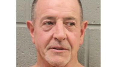 Michael Lohan's mugshot released. (Harris County Sheriff's Office.) Michael Lohan's mugshot released. (Harris County Sheriff's Office.)