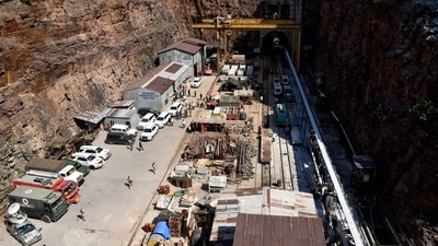 Accumulation of water and mud around the collapse site has made the rescue ops difficult. (PTI)