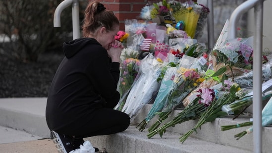 Pennsylvania hospital shooting: A person gets emotional after leaving flowers in front of the West York Police Department after a police officer was killed responding to a shooting at UPMC Memorial Hospital in York, Pa. on Saturday, Feb. 22, 2025. (AP Photo/Matt Rourke) (AP)
