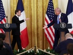 U.S. President Donald Trump and French President Emmanuel Macron hold a press conference, at the White House in Washington, D.C., U.S., February 24, 2025. 