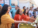 Katrina Kaif and spiritual head of Parmarth Niketan Ashram Swami Chidanand Saraswati distribute food to needy during the ongoing Maha Kumbh Mela 2025, in Prayagraj, Monday, Feb. 24, 2025. (PTI Photo)(PTI02_24_2025_000422A) Katrina Kaif and spiritual head of Parmarth Niketan Ashram Swami Chidanand Saraswati distribute food to needy during the ongoing Maha Kumbh Mela 2025, in Prayagraj, Monday, Feb. 24, 2025. (PTI Photo)(PTI02_24_2025_000422A)