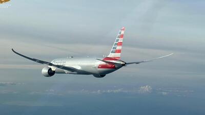 An Italian Air Force Eurofighter aircraft escorts an American Airlines plane in this handout photo. (Reuters photo)
