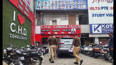 Bathinda police conducting raids at immigration centres on Tuesday. Sanjeev Kumar/HT (Sanjeev Kumar/HT)
