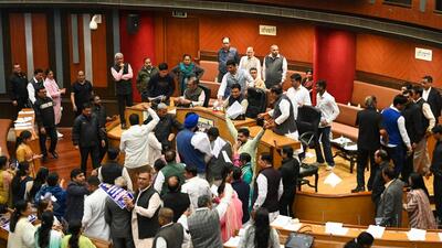Councillors grapple with one another at the MCD meeting. (Sanchit Khanna/HT Photo) Councillors grapple with one another at the MCD meeting. (Sanchit Khanna/HT Photo)