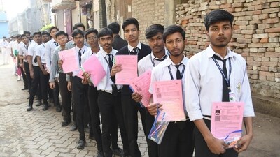 Students waiting in queue outside the St. Dominic Savio's High School in Danapur, Patna to appear in the CBSE Class 10th examination. (Santosh Kumar ) Students waiting in queue outside the St. Dominic Savio's High School in Danapur, Patna to appear in the CBSE Class 10th examination. (Santosh Kumar )