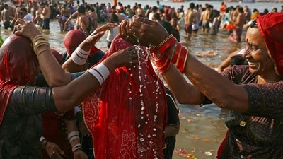 Monday was the 30th day in succession when an average of over a crore devotees took the holy dip at Sangam as the trend started from January 26 onwards. In pic: Pilgrims take a holy dip in Sangam, the confluence of Ganges, Yamuna and mythical Saraswati rivers, on the eve of Maha Shivaratri during the Maha Kumbh Mela festival 2025. (AFP) Monday was the 30th day in succession when an average of over a crore devotees took the holy dip at Sangam as the trend started from January 26 onwards. In pic: Pilgrims take a holy dip in Sangam, the confluence of Ganges, Yamuna and mythical Saraswati rivers, on the eve of Maha Shivaratri during the Maha Kumbh Mela festival 2025. (AFP)