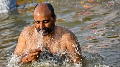 A pilgrim takes a holy dip in Sangam, the confluence of Ganges, Yamuna and mythical Saraswati rivers, on the eve of Maha Shivaratri during the Maha Kumbh Mela festival in Prayagraj (AFP) A pilgrim takes a holy dip in Sangam, the confluence of Ganges, Yamuna and mythical Saraswati rivers, on the eve of Maha Shivaratri during the Maha Kumbh Mela festival in Prayagraj (AFP)