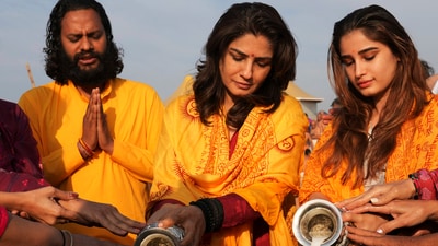 Bollywood actor Raveena Tandon, center, and her daughter Rasha Thadani, right, pray after ritualist dips at Sangam, the confluence of rivers the Ganges, the Yamuna and the mythical Saraswati during the Maha Kumbh festival, in Prayagraj, India (AP) Bollywood actor Raveena Tandon, center, and her daughter Rasha Thadani, right, pray after ritualist dips at Sangam, the confluence of rivers the Ganges, the Yamuna and the mythical Saraswati during the Maha Kumbh festival, in Prayagraj, India (AP)