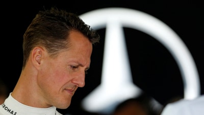 File photo: Mercedes Formula One driver Michael Schumacher of Germany stands inside his team garage during the first practice session of the Japanese F1 Grand Prix at the Suzuka circuit October 5, 2012. (REUTERS)