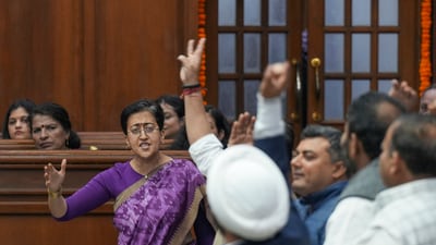 Leader of Opposition and AAP MLA Atishi and other party MLAs protest during the first day of the Delhi Legislative Assembly session, in New Delhi, Monday, (PTI) Leader of Opposition and AAP MLA Atishi and other party MLAs protest during the first day of the Delhi Legislative Assembly session, in New Delhi, Monday, (PTI)