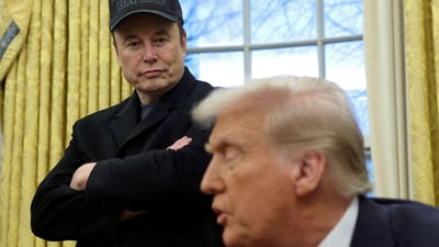 FILE PHOTO: Elon Musk listens to U.S. President Donald Trump speak in the Oval Office of the White House in Washington, D.C., U.S., February 11, 2025.   REUTERS/Kevin Lamarque/File Photo (REUTERS)