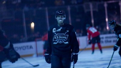 Team Black player singer Justin Bieber skates during the Skate for LA Strong celebrity hockey game Team Black player singer Justin Bieber skates during the Skate for LA Strong celebrity hockey game