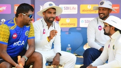 Sachin Baby, with ball in hand, with the 'unsung heroes' of Kerala's run up to the Ranji Trophy final (Sachin Baby's Instagram) Sachin Baby, with ball in hand, with the 'unsung heroes' of Kerala's run up to the Ranji Trophy final (Sachin Baby's Instagram)