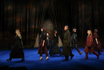 Models present creations at the Burberry catwalk show during London Fashion Week in London, Britain. (REUTERS)