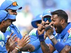India's Hardik Pandya with captain Rohit Sharma and teammates celebrates India's Hardik Pandya with captain Rohit Sharma and teammates celebrates