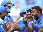 India's Hardik Pandya with captain Rohit Sharma and teammates celebrates a wicket during the ICC Champions Trophy 2025- Group A match against Pakistan