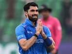 Ibrahim Zadran celebrates after scoring a century during the ICC Champions Trophy match between England and Afghanistan